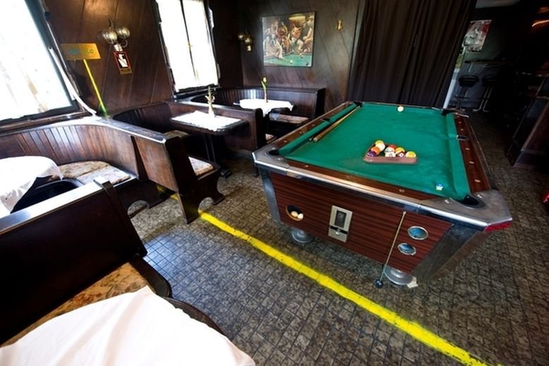 The bar and dining table for guests are on Slovenian soil, but if they want to play billiards or go to the toilet, they are on Croatian soil. Kalin Tavern, Croatia