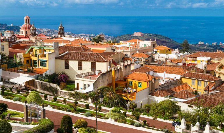 Tenerife has houses painted yellow and with red tiled roofs